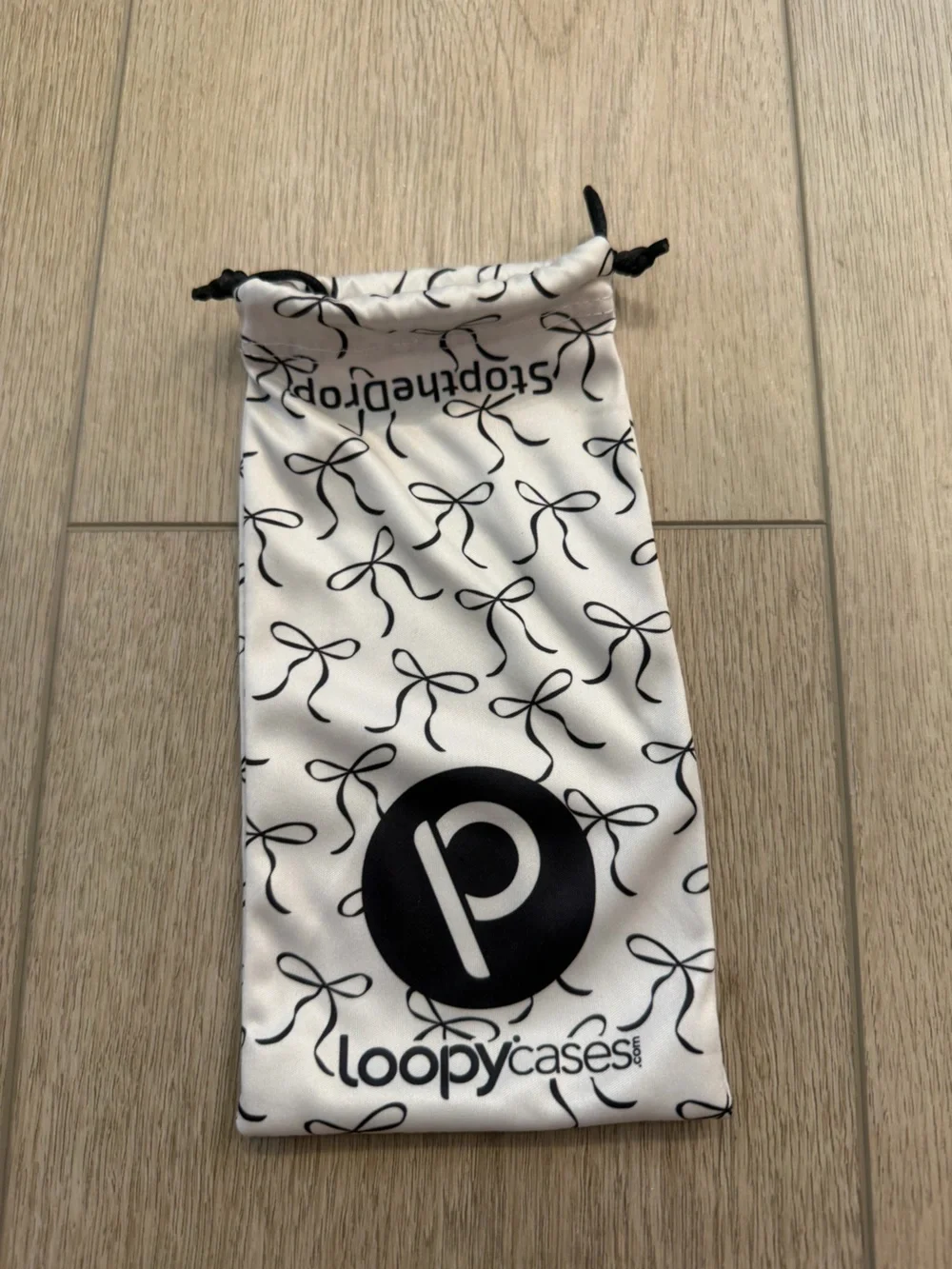 Loopy iPhone 13 Pro Black & White Bow Pattern Phone Case with Matching Pouch